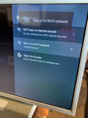 How do I connect my Philips Android TV to a network that requires a login such as in a dorm room or hotel?