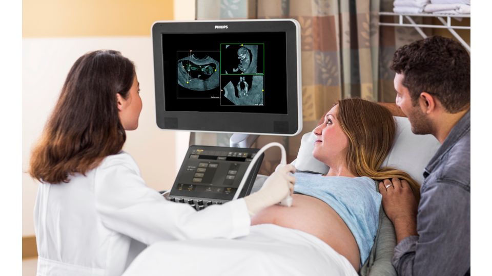 Pregnant woman getting ultrasound