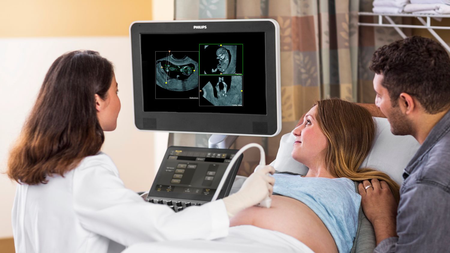 Pregnant woman getting ultrasound