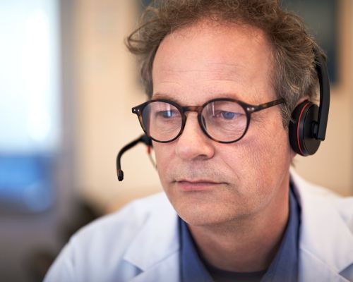 Pathologist looking at screen