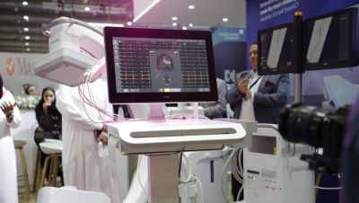 Philips clinical workstation displaying patient monitoring data at exhibition booth