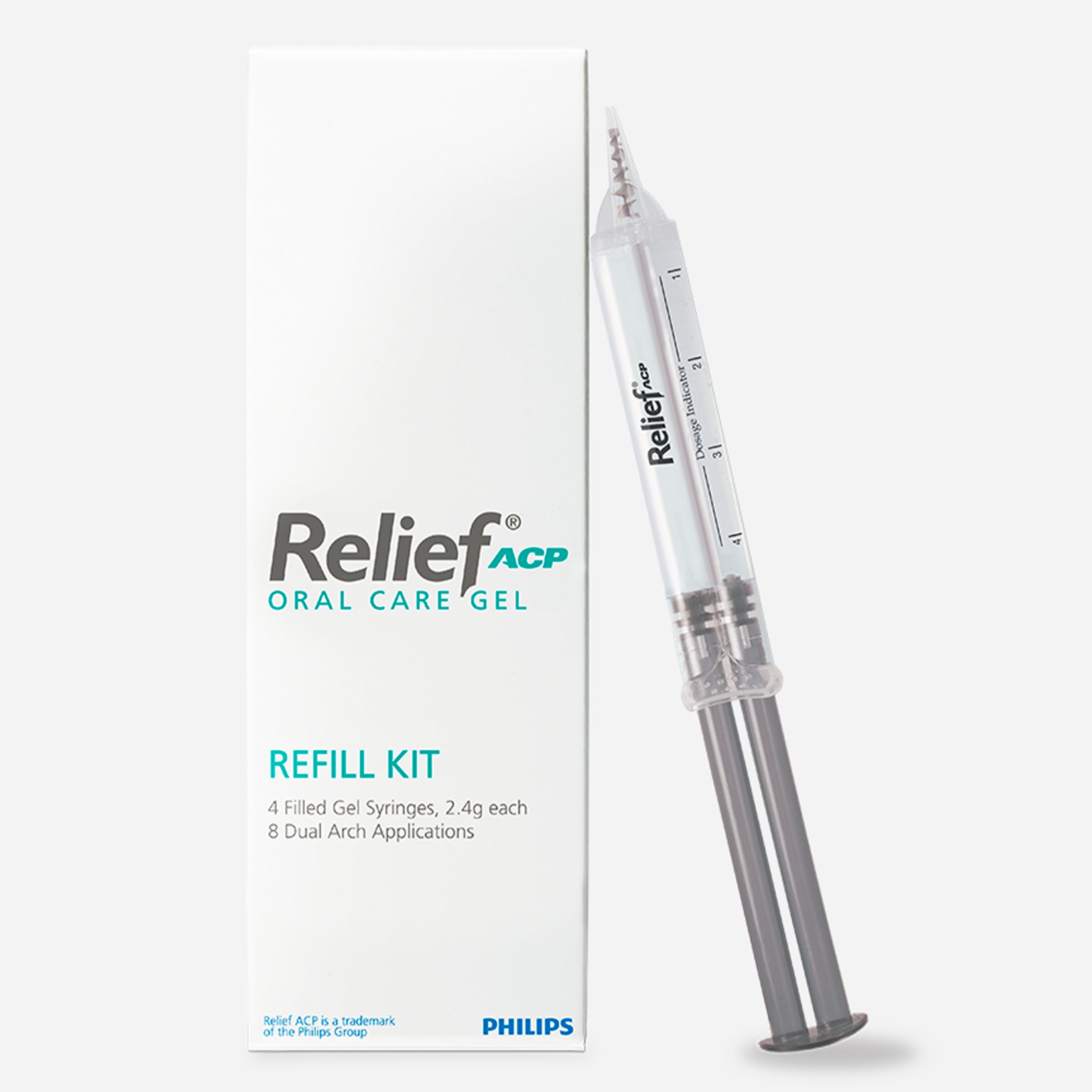 A Philips Zoom! whitening syringe leaning against a refill kit box