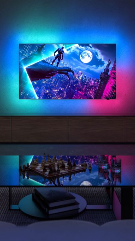Philips OLED 950 TV showing city scene with Ambilight