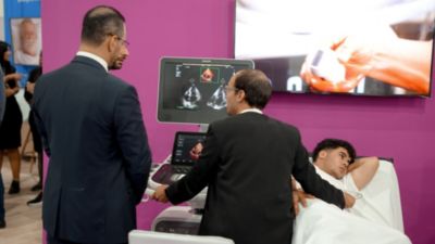Clinicians demonstrating Philips ultrasound imaging during Africa Health ExCon