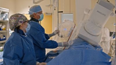 Medical team operating Philips imaging system during cardiac procedure at TriHealth Heart & Vascular Institute