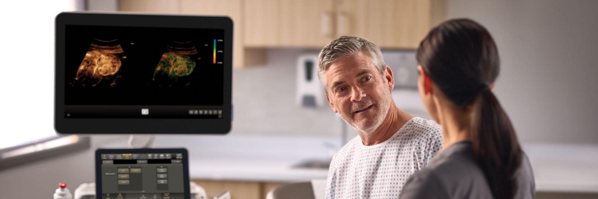 Patient and professional discuss contrast ultrasound