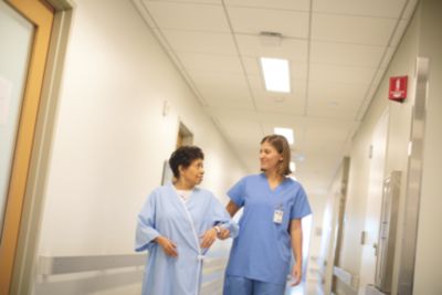 Nurse walking with a patient