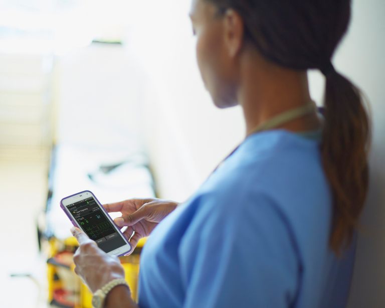 caregiver with phone