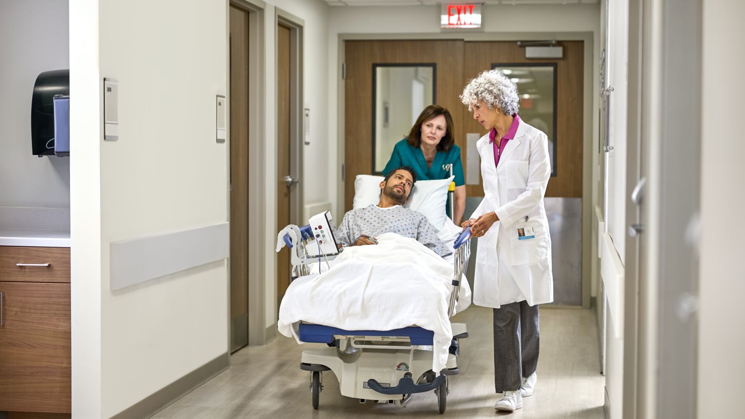 nurse moving the stretcher