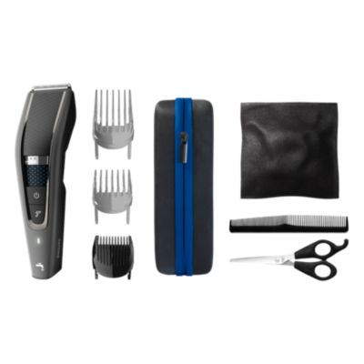  HC7650 / 15 - Hair clipper with titanium blades, 3 combs 28 length settings, 90 min cordless use, includes 3 combs and travel pouch