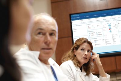 Medical team reviewing patient data