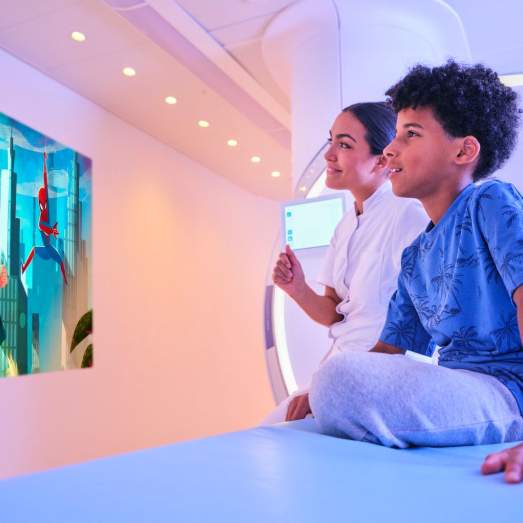 Boya and technician looking at Disney Captain Marvel theme for Ambient Experience for MR