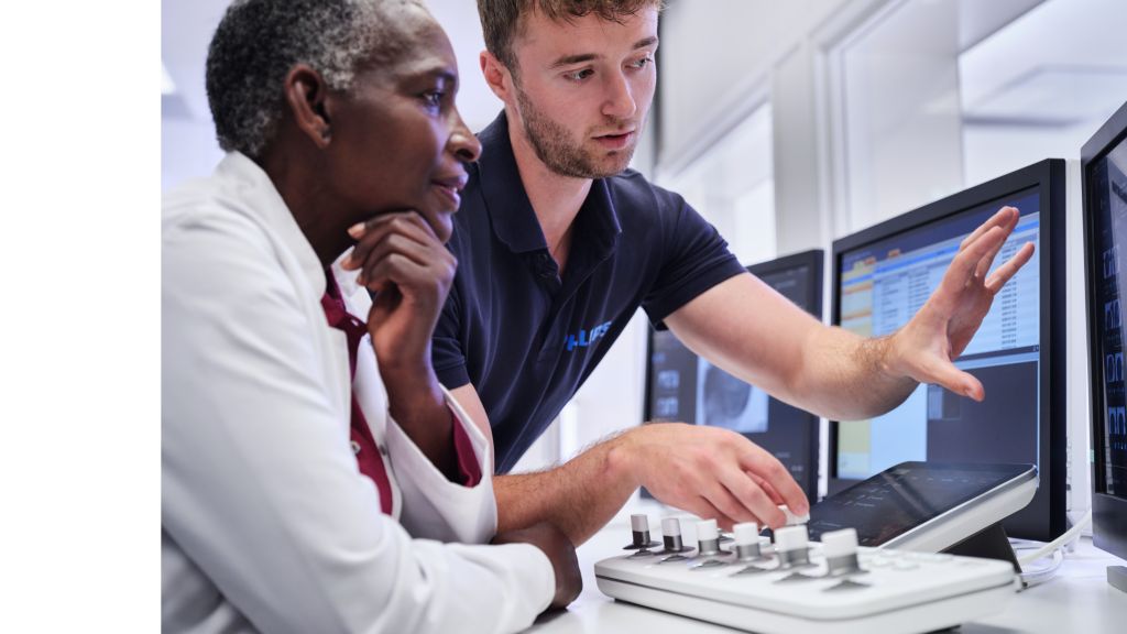 Field engineer and clinician in control room