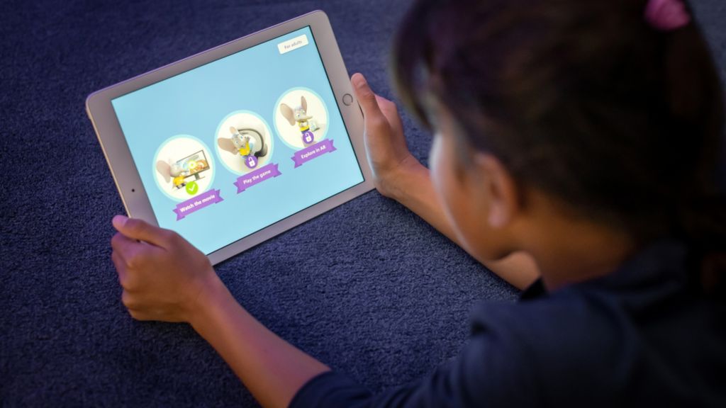 Girl playing with the Philips Scan Buddy app