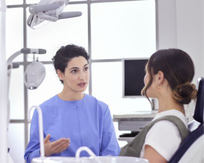 A dental professional holding a Philips Zoom! Proven efficacy