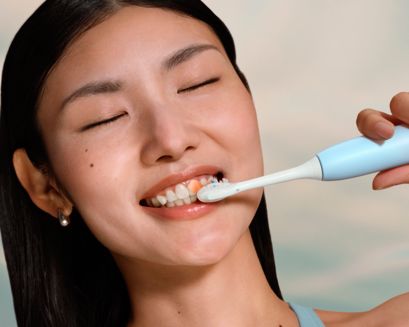 A patient brushing with a Philips Sonicare 6300
