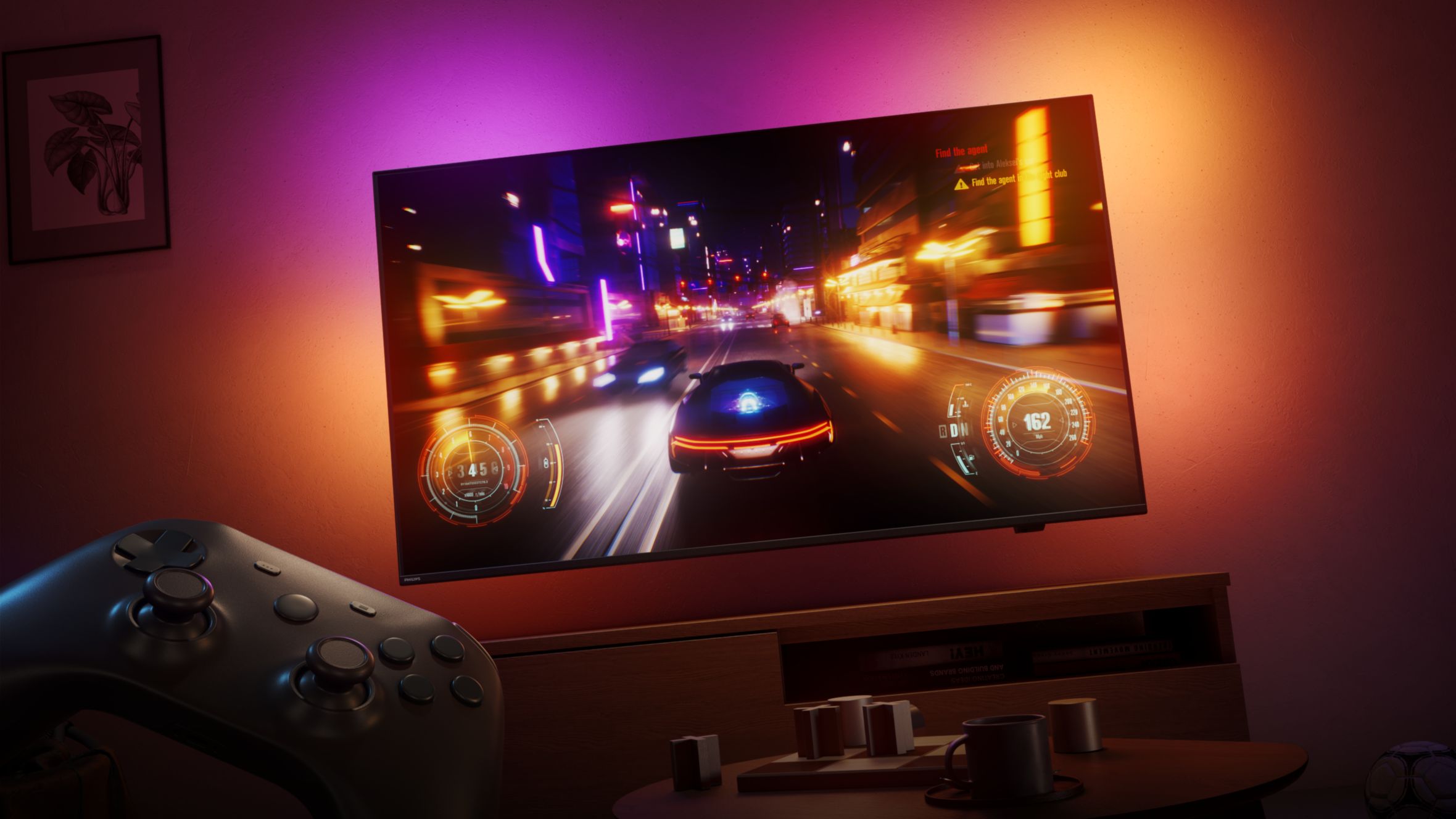 A racing video game is displayed on a Philips Ambilight TV in a dimly lit room
