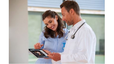 Clinicians with tablet using Enterprise Viewer on an IPad