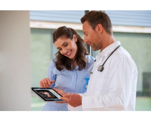 Clinicians with ipad