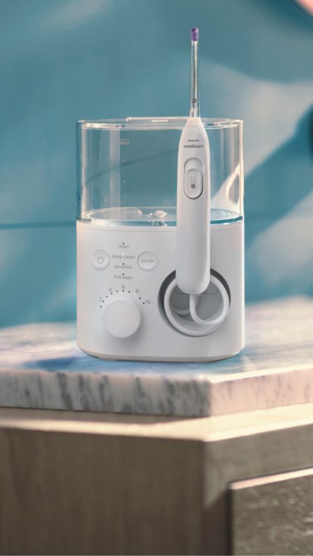 Philips Sonicare Power Flosser standing on a countertop