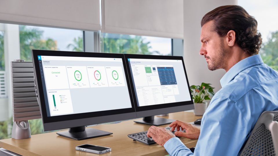 Clinician reviewing MDIP Dashboard and Neuron CX
