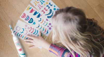 Fun stickers help kids turn their toothbrush into a friend