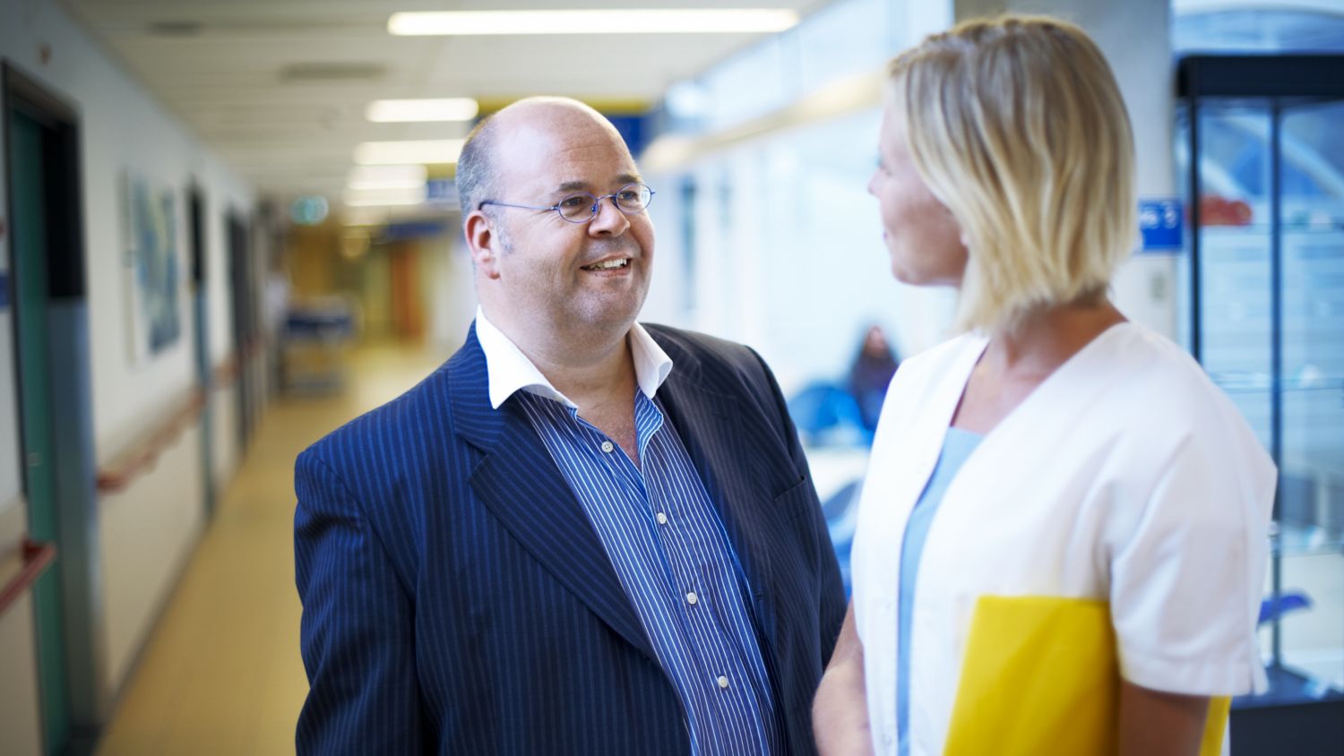 Patient talking to technologist