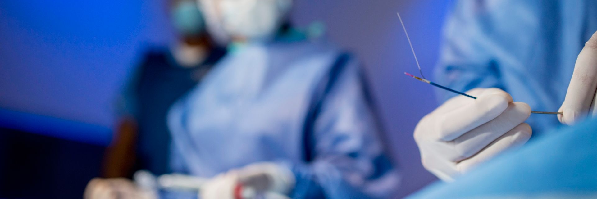 Clinicians use a lesion crossing device during an interventional procedure.