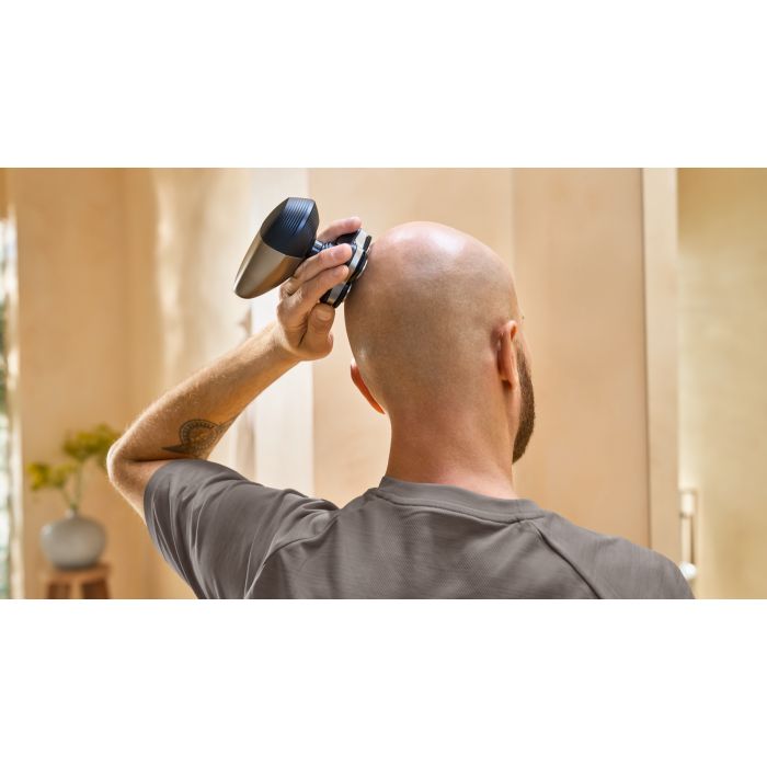Head Shaver Pro 9000 Series Premium shaver with deluxe accessories