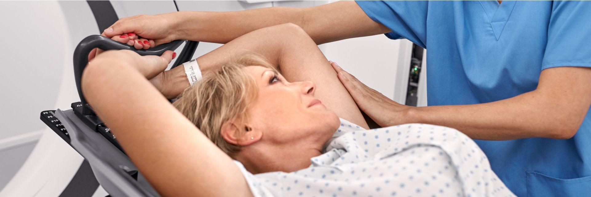 patient and tech in ct rt scanner