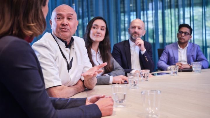 Pediatric patient is looking to the ambient experience wall in the MR room