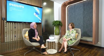 Leaders exchange smiles during Women’s Day interview