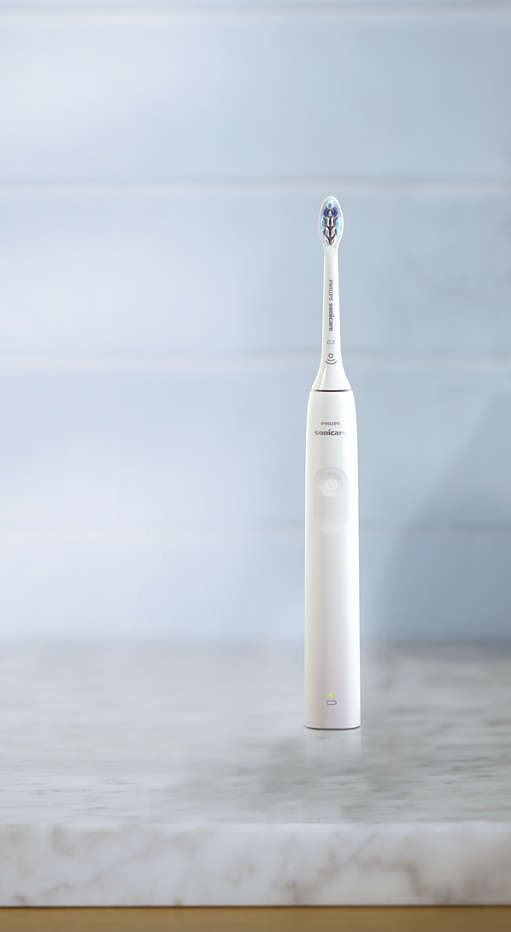 Philips Sonicare 2300 power toothbrush standing on a countertop