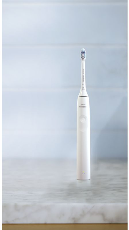 Philips Sonicare 2300 power toothbrush standing on a countertop