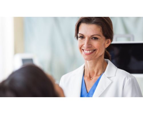 Tech and radiologist looking at screen