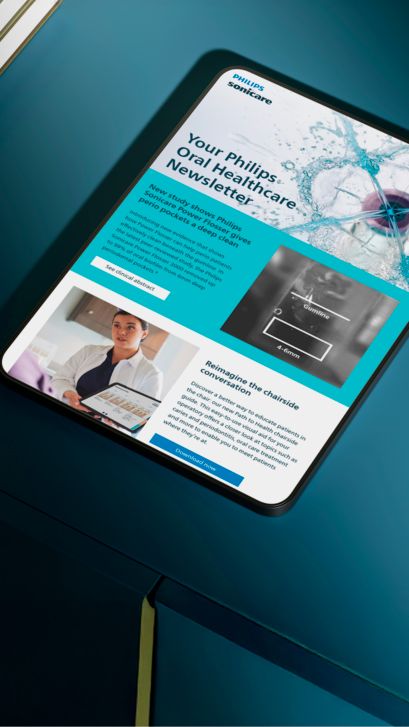 A tablet showing the Philips Oral Healthcare newsletter.