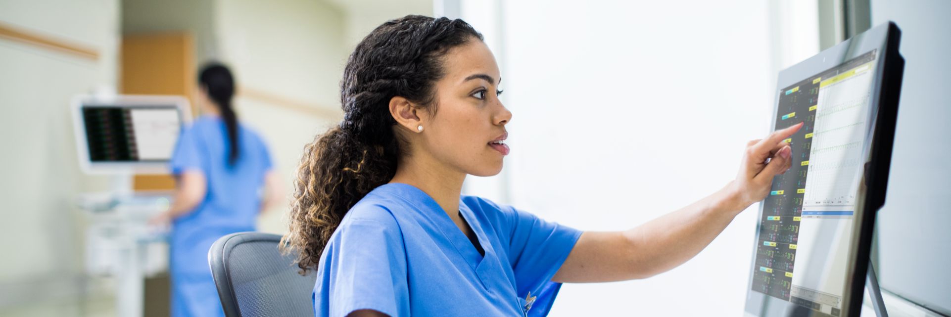 Clinician reviewing patient data on PIC iX