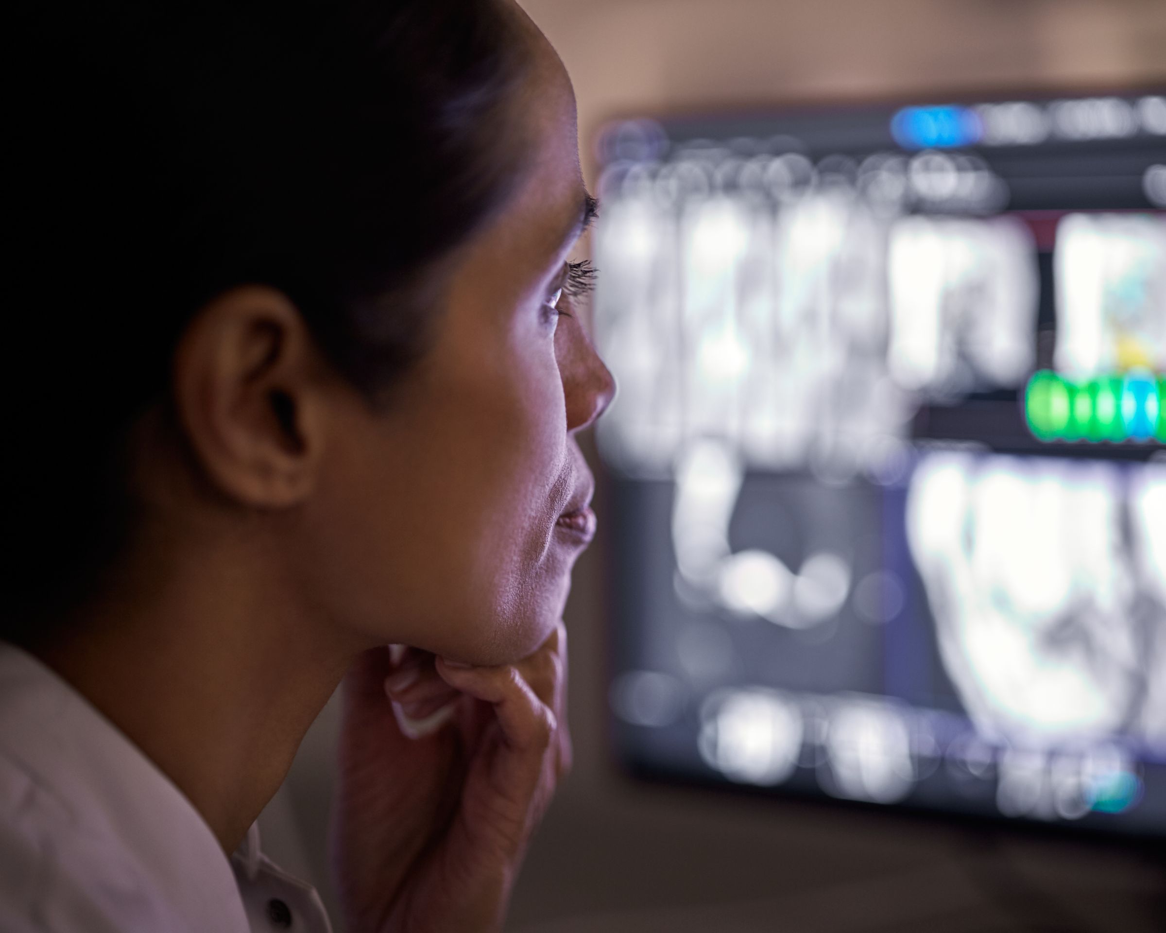 Radiologist reviewing images on the MR console