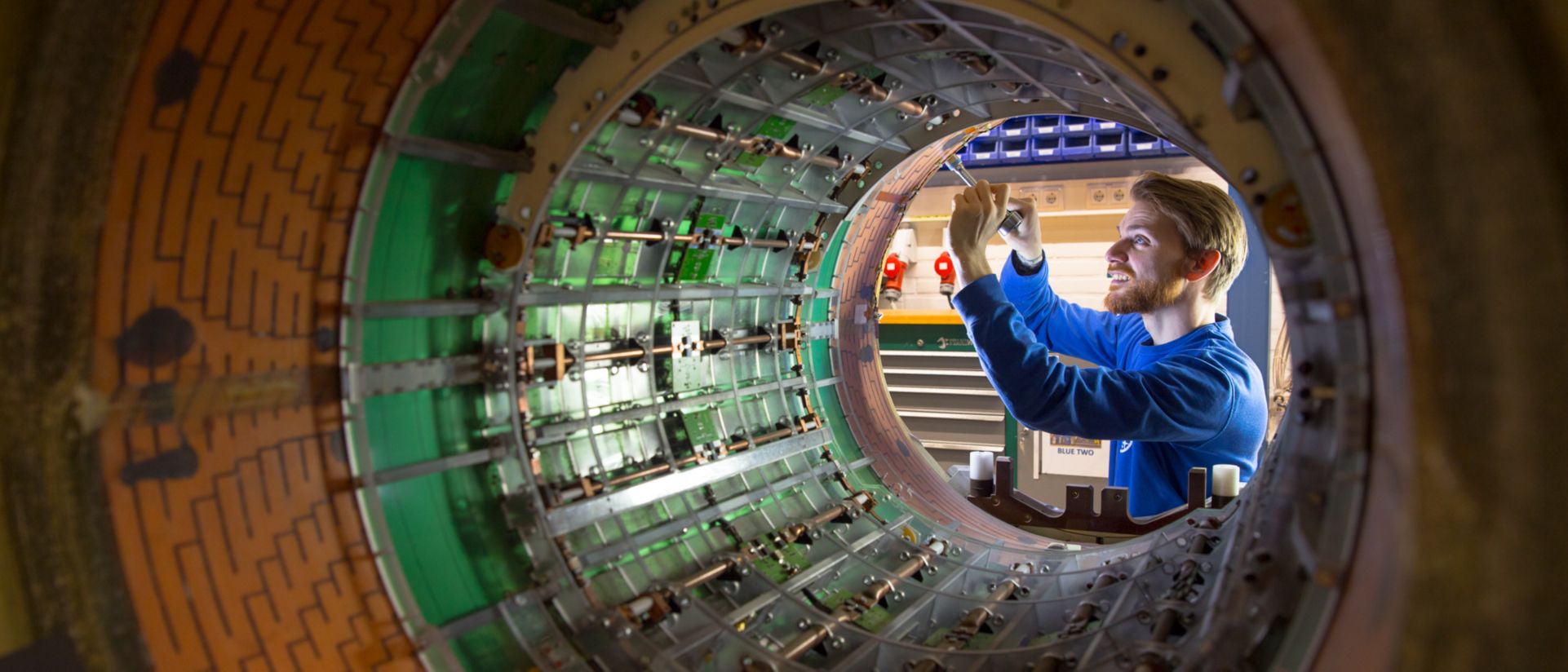 A Philips employee works on an MR system.