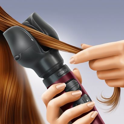 Style bouclé ou lisse avec le boucleur soufflant