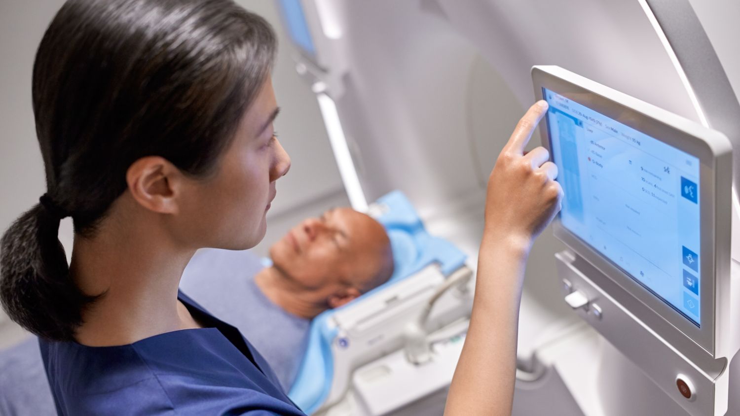 Technologist uses Ingenia Elition X