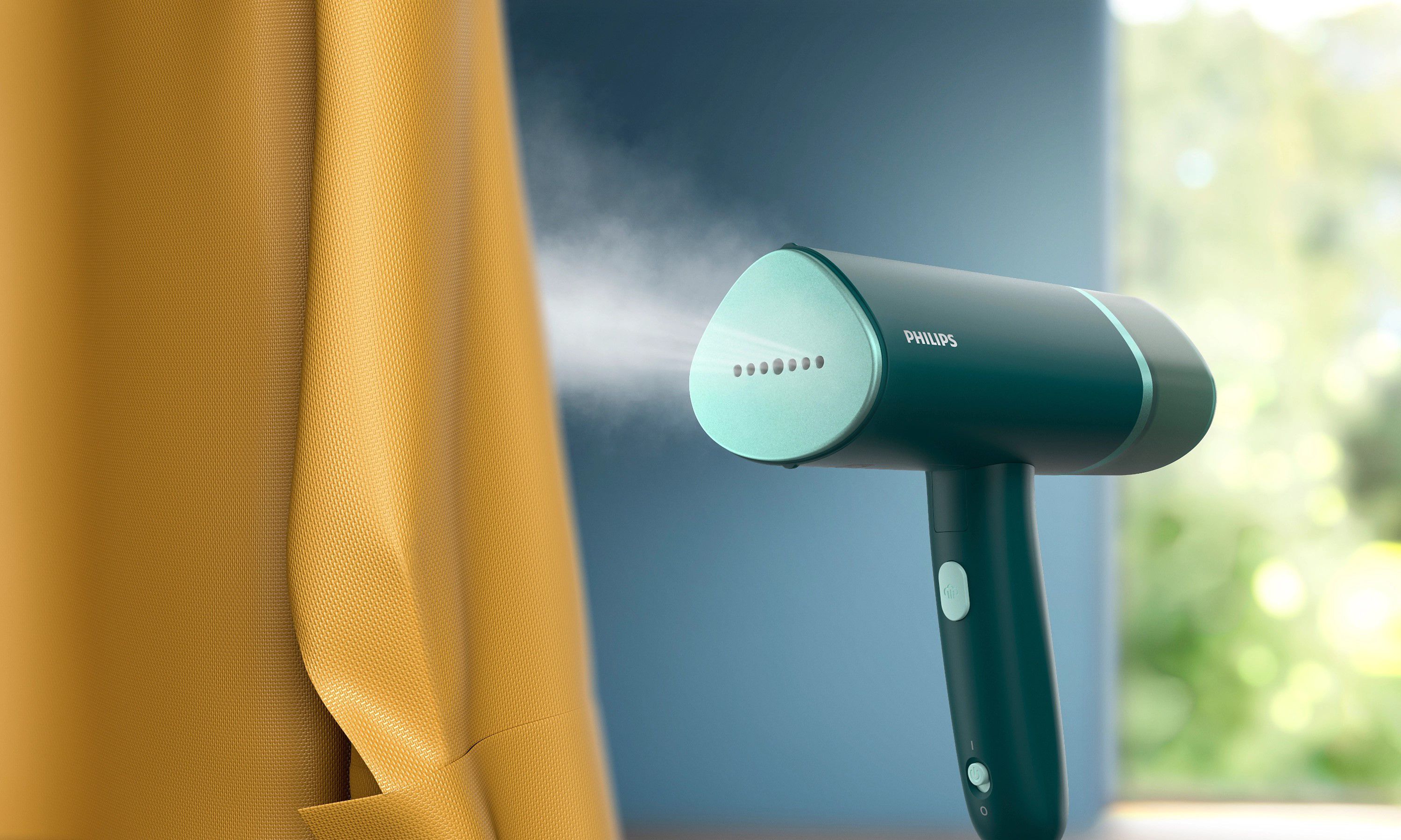 Philips Steamer 3000 Series STH3020/70 in turquoise steaming clothes