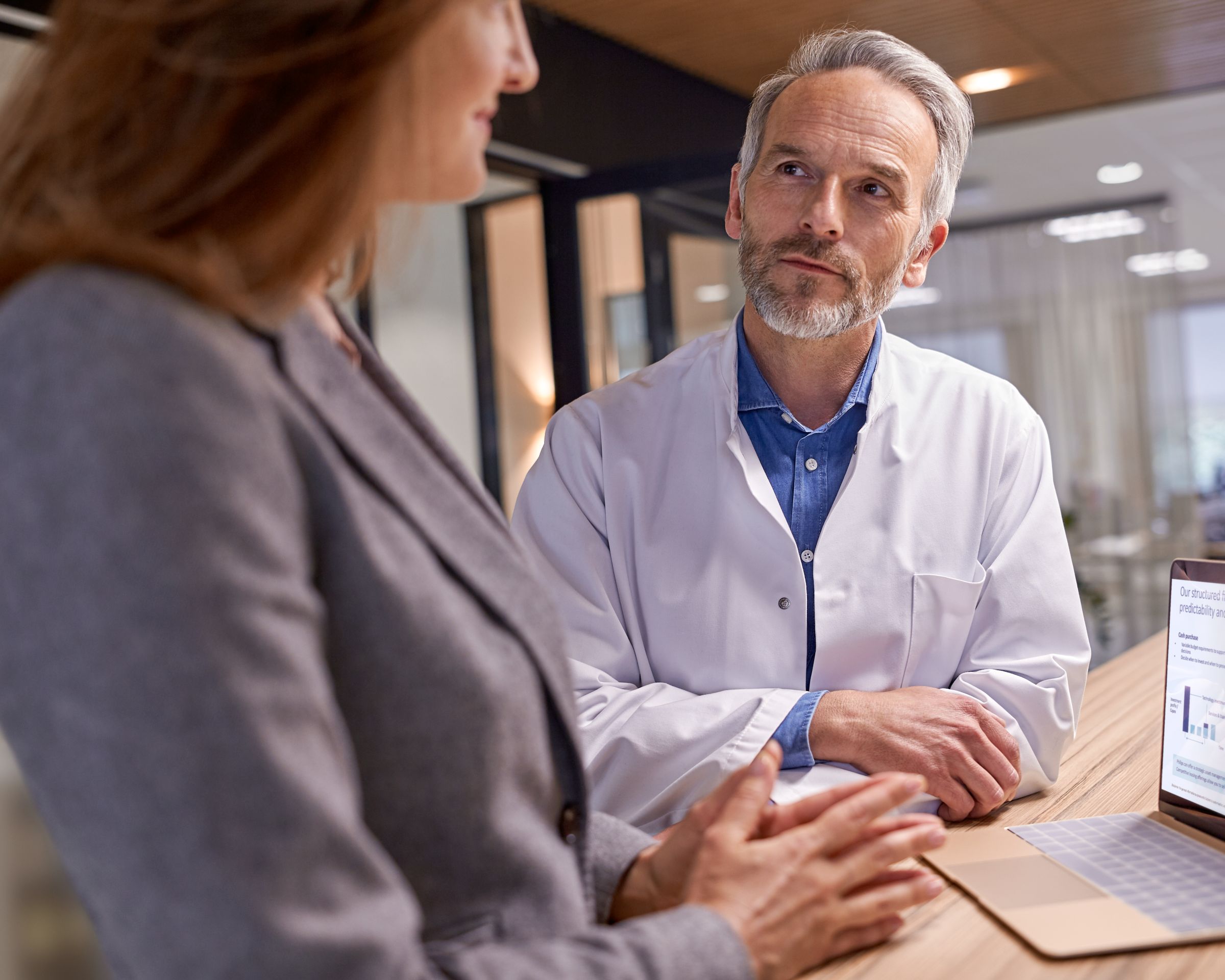 Radiologist talking to a Philips representative