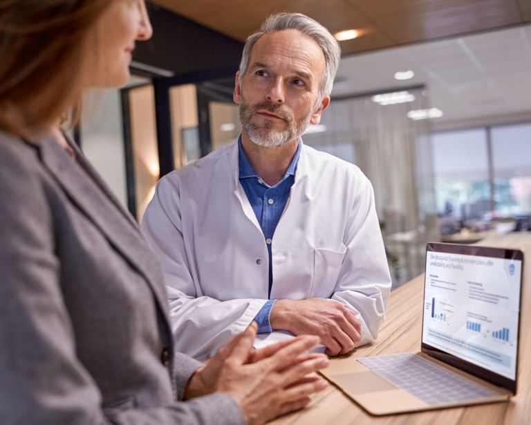 Radiologist talking to a Philips representative