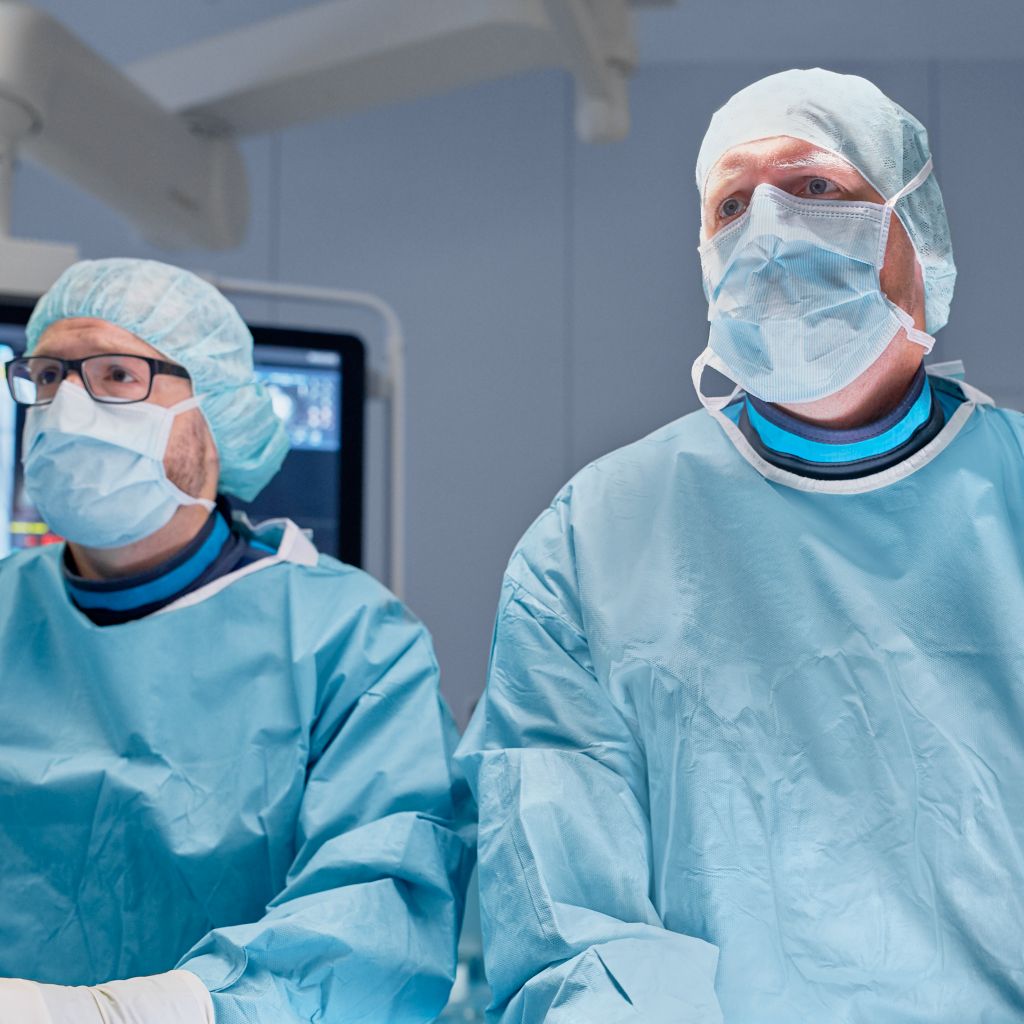 Surgeons performing surgery