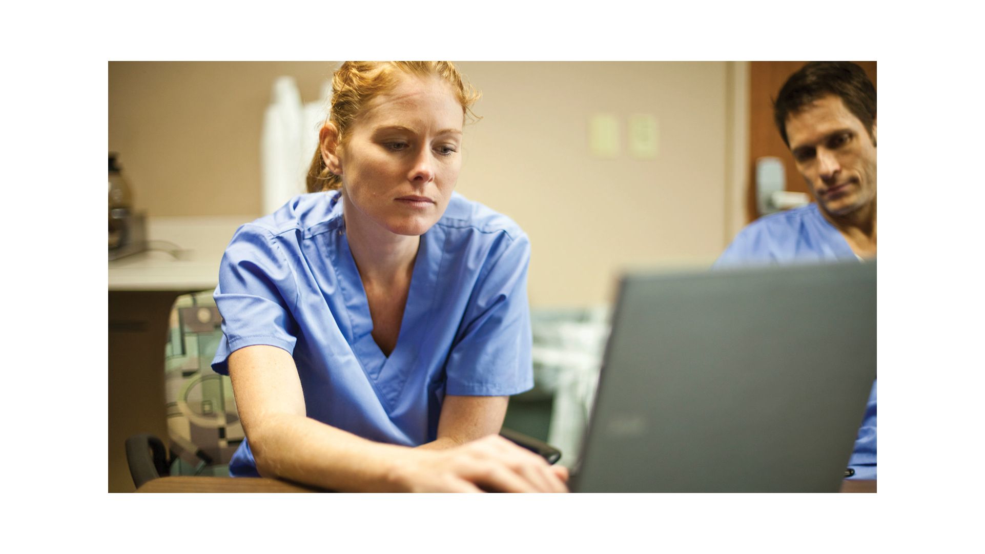 Clinician at computer