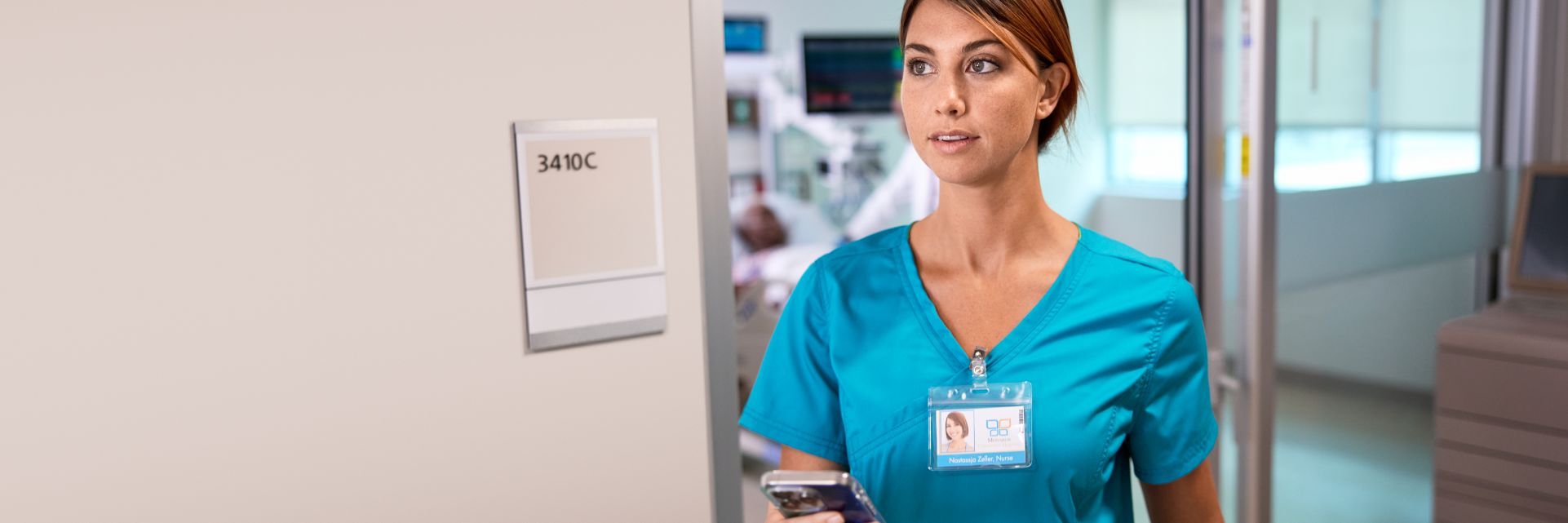 Physician checking Care Assist on tablet