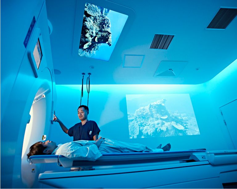 Section Chief, Radiology Department with patient for a CT scan with Ambient Experience at the Tokyo Metropolitan Geriatric Medical Center 