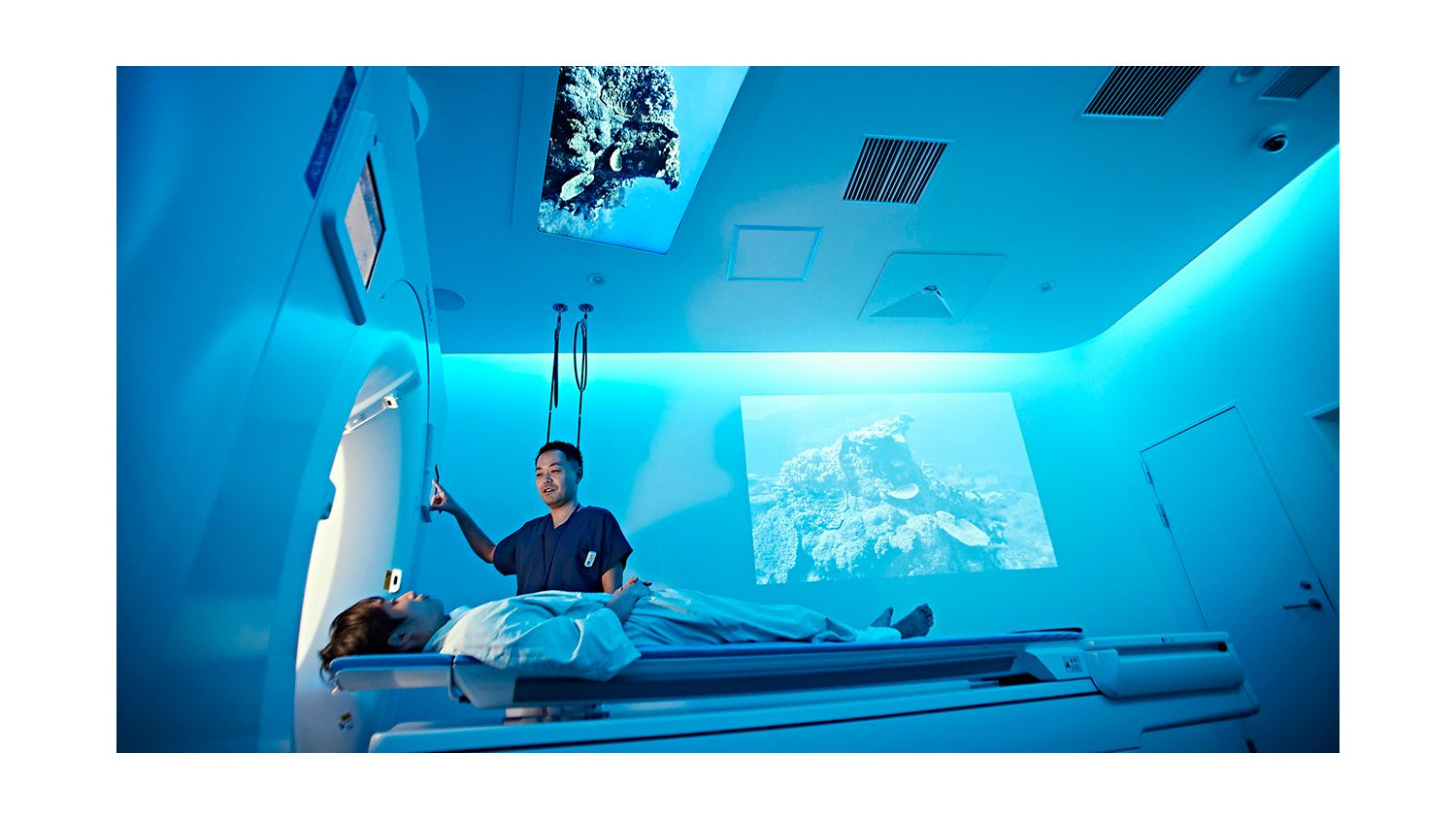 Section Chief, Radiology Department with patient for a CT scan with Ambient Experience at the Tokyo Metropolitan Geriatric Medical Center 
