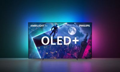 Philips OLED plus television with four sided Ambilight illuminating wall